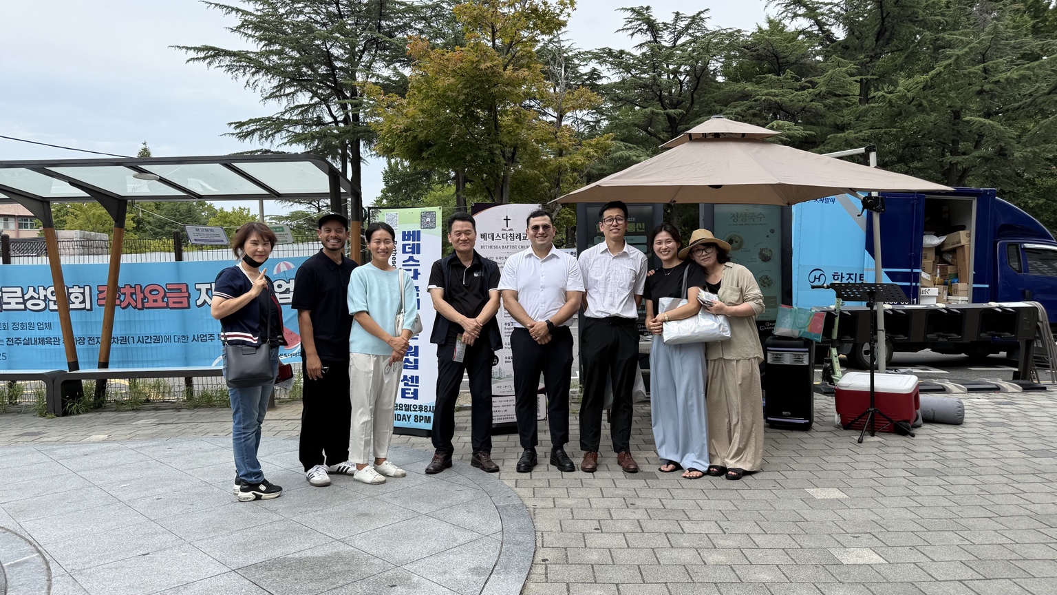 Church members gathered at an outdoor gospel outreach in Jeonju